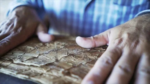 4K Cuban man preparing a Cigar tobacco leaf in Cuba Vinales in slowmotion Stock Footage 77491250