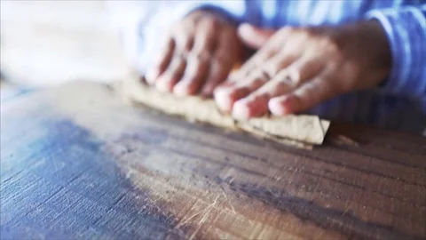 4K Cuban Man rolling a Cigar in Cuba in slowmotion Stock Footage 77458192