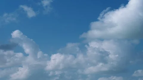 4K Cumulus Clouds timelapse on bright blue sky Stock Footage 263095966