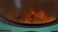 4K curry with rice cooking and spinning on a plate in microwave oven 4k or 4k+ Resolution