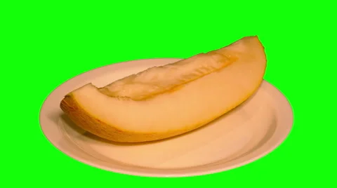 4k – Cutted melon (piece of melon) on plate Stock Footage 56731963