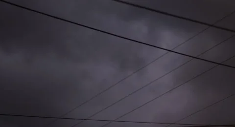 4K Dark clouds passing by telephone wires timelapse 스톡 동영상 40344150