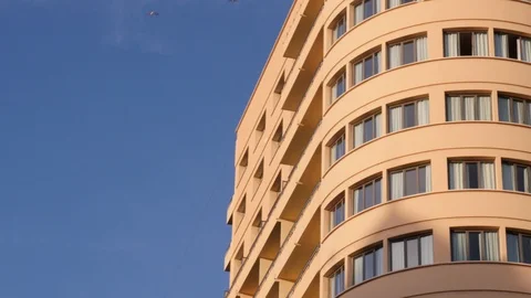 4k day low angle static shot of the side of a highrise art deco style building Stock Footage 124551625