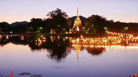 4k day to night Time-lapse of  light in Buddha Statue Video stock 69939351