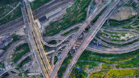 4K Day-to-night Time-lapse of Busy Traffic at Urban Interchange Stock Footage 341791176