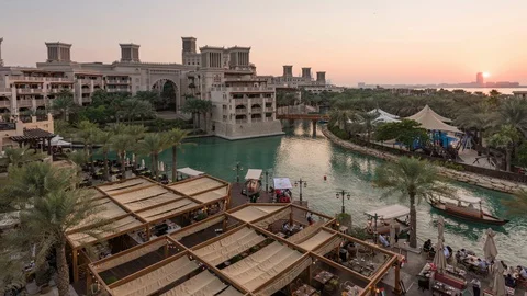 4K Day to Night Timelapse of Abras in Madinat Jumeirah Dubai Stock Footage 129234812