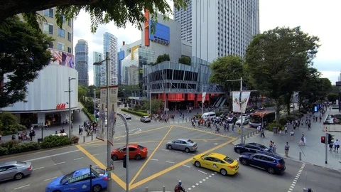 4k day time lapse of pedestrian traffic scramble road crossing at Orchard Road Stock Footage 102721113