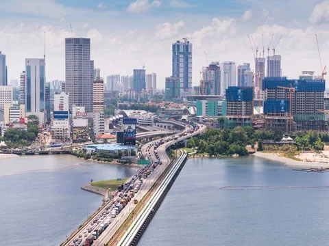 4K day timelapse of clouds and the city of Johor Bahru, Malaysia Stock Footage 84757290