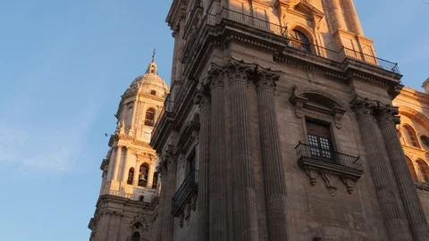4k daylight high angle pan shot of the facade of a roman catholic cathedral Stock Footage 123664750