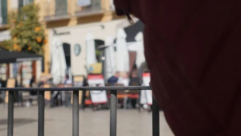 4k daylight selective focus static shot of a man hand grabbing an iron fence and Stock Footage 124138349