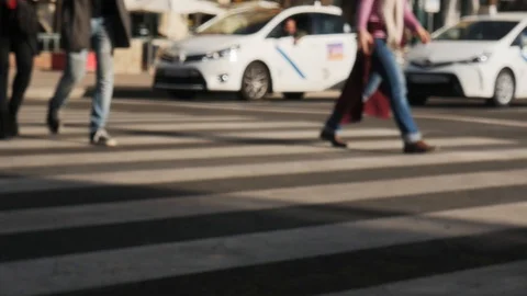 4k daylight slightly blurred slow motion close up static shot of a crosswalk Stock Footage 124202922