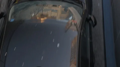4k daylight tracking shot of a black car exiting an underground parking. Stock Footage 122820894