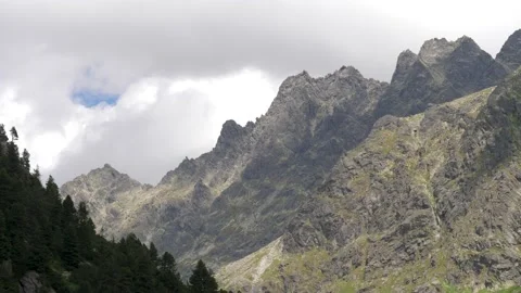 4k Daytime panning shot of steep rock faces, Tatra Mountains, Slovakia. Stock Footage 168346921