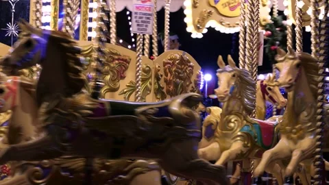 4K: Decelerating Horse Carousel Galloper at Night Stock Footage 256984819