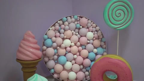 4K Decor for birthday with candy and macaroon Stock Footage 165617402
