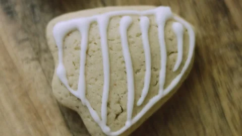 4K Decorated Bell Gingerbread Cookie Photographed in Macro Detail Stock Footage 342113743