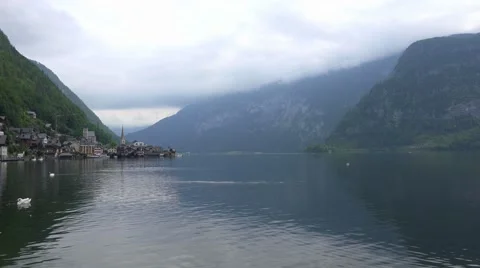 4k Deep clouds at Hallstatt lake early morning panning shot Stock Footage 51348139