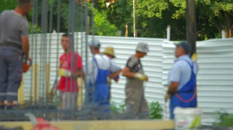 4k, Defocused construction workers on a building site Stock Footage 53227482