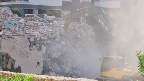 4k, Demolition machine is breaking the f... | Stock Video | Pond5