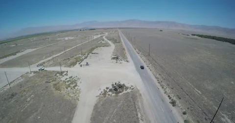 4k Desert Road High Car Follow Stock Footage 67955906