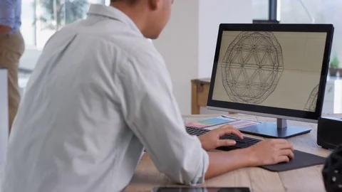 4K Designer working, creating 3D printed objects from computer software Stock Footage 73800178