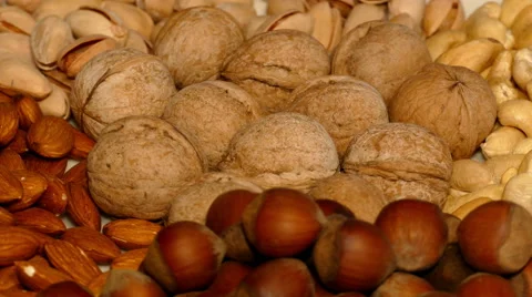 4k – Different nuts on plate Stock Footage 56155030