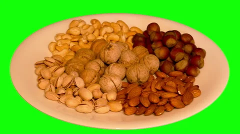 4k – Different nuts on plate Stock Footage 56849849