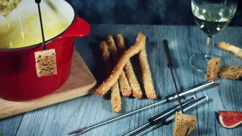 4k Dipping Bread in Mixed Cheese Fondue 스톡 동영상 80542971