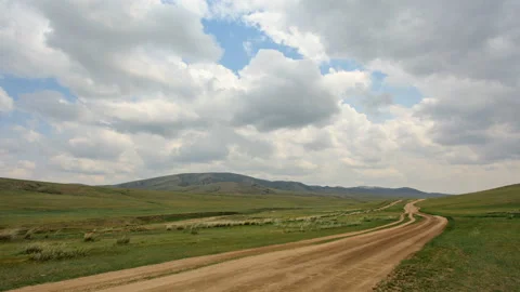 4K. Dirt road in the steppes of the Gobi, Mongolia. Ultra HD, 4096x2304 Stock Footage 106938434