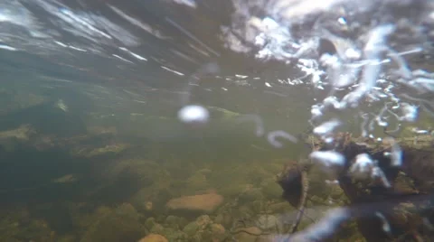 4K diver underwater in strong stream bubbles, very clear water and bubbles Stock Footage 47269544