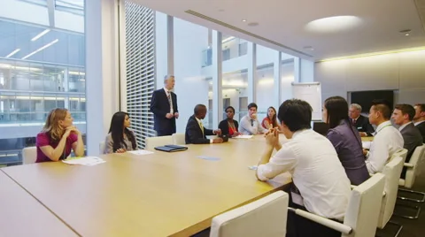 4K Diverse business team in boardroom meeting in a large modern office building. Stock Footage