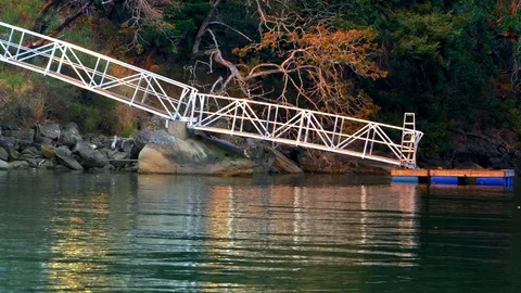 4K Dock and Ramp on Calm Water, Beautiful Nature Light Reflection Stock Footage 81078745