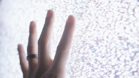 4K Dolly Across Hand on Static TV Close Video stock 93487355