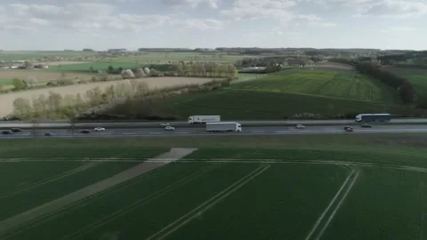 4K dolly droneshot of trucks Stock Footage 240642909
