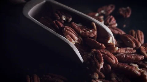 4k Dolly Shot of Pecan Nuts in Scoop Stock Footage 78046602