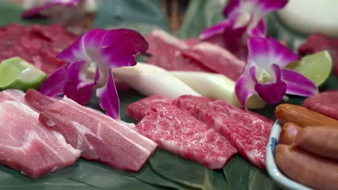 4K Dolly shot: Wagyu beef on a tray in a japanese yakiniku restaurant. Stock Footage 144325080