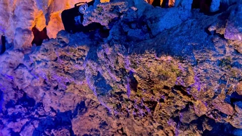 4K Dramatic Purple and Blue Limestone Rock Formations Inside Cave Okinawa, Japan Stock Footage 345376151