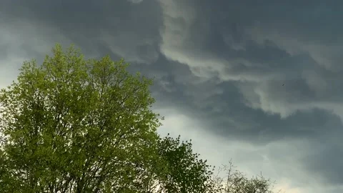 4K Dramatic Spring Rain Clouds Moving Quickly Across Sky Background Stock Footage 238710242
