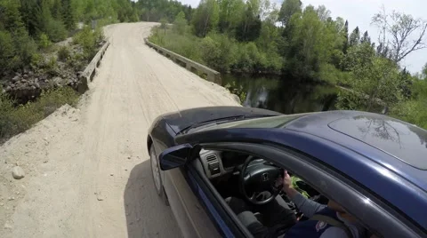 4k driver films self going over neat bridge Stock Footage 51712337