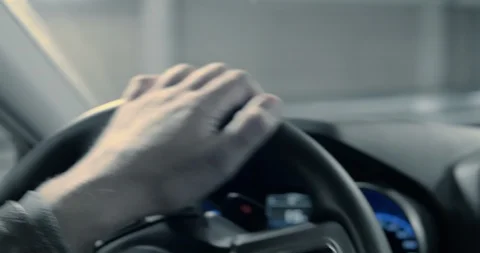4K - Driver hands on a car steering wheel. Close-up Stock Footage 117854136