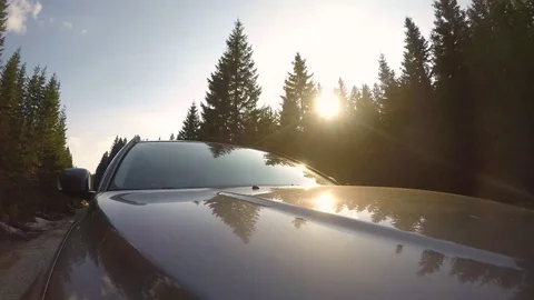 4K : Driving car with sunset sky at the background Stock Footage 74124489