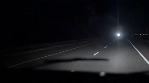 4k Driving down highway road at night with big rig truck passing by Stock Footage 57335985