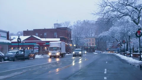 4K: Driving during light snow fall in small town in New Jersey in December Stock Footage 120989712
