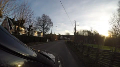 4K driving in evening sun through suburbian environment in Sweden Stockbeeldmateriaal 47275964
