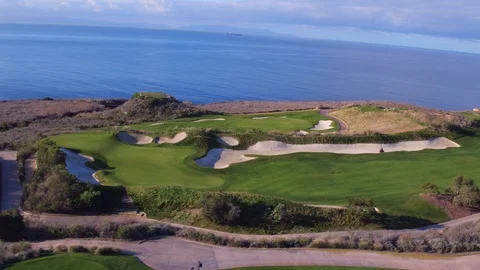 4K drone 360 degree orbiting shot of Trump National Los Angeles golf course Stock Footage 89662132