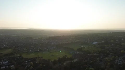 4K drone aerial of Distant Sun, Wirral, UK Stock Footage 307511037