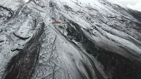 4k drone aerial mountain volcano refuge ecuador snow hiking hike landscape Stock Footage