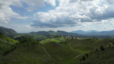 4K drone aerial over mountain village – scenic rural landscape Stock Footage 344540518