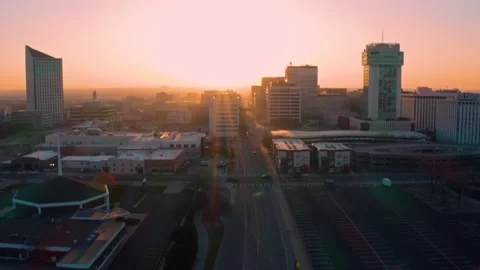 4K Drone Aerial Sunrise Downtown Wichita Kansas Skyline Street Reveal Stock Footage