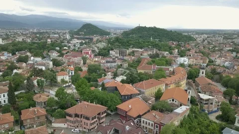 4K Drone aerial view of cloudy city with hills Stock Footage 124792708
